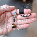 Infographic of Lava Stone Diffuser Tactile Necklace feauting collapsible hematite and spinner crystals