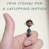 Spin the Stones of Lava Stone Crystal Roller Tiger Eye