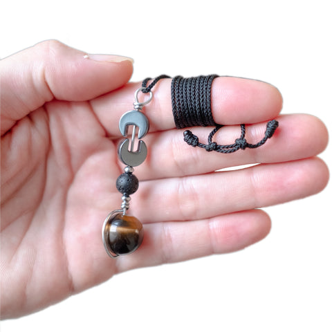 Tiger Eye and Lava Stone Tactile Necklace in Hand