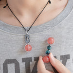 Cherry quartz necklace and crystal roller with blue tiger eye for fidgeting