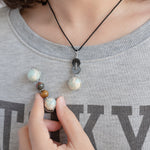 Imperial jasper necklace and crystal roller with tiger eye for skin and hair picking